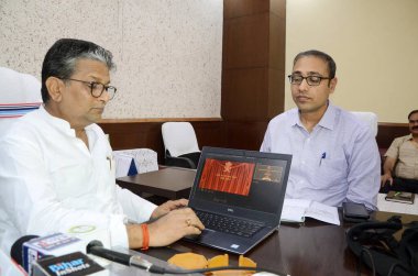 PATNA INDIA MAY 2 2023 Bihar Minister for Revenue and Land Reforms Alok Mehta inaugurating mobile app at his chamber on May 2 2023 in Patna India Photo by Santosh Kumar Hindustan Times clipart