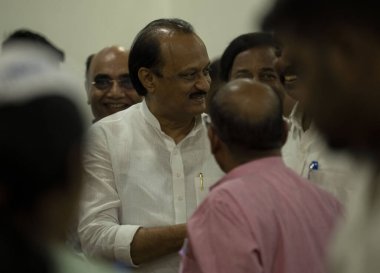 MUMBAI INDIA MAY 5 2023 NCP leader Ajit Pawar interacts with party workers at NCP Party Office Ballard Estate on May 5 2023 in Mumbai India NCP workers on Friday were seen celebrating outside the party office after NCP s committee rejected Sharad Paw clipart