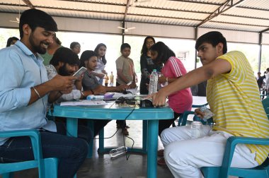 GURUGRAM INDIA MAY 7 2023 A National Eligibility cum Entrance Test NEET candidates stand in a queue for thermal screening before entering the examination centre in Drona Public School at Ravi Nagar Basai Road near Government college sector 9 on May 7