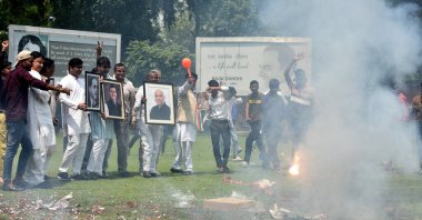 NEW DELHI INDIA MAY 13 2023 Congress workers and supporters celebrate after winning the Karnataka Assembly Election at AICC HQ on May 13 2023 in New Delhi India Congress has won 135 seats well above the majority mark of 113 seats in a 224 seat state  clipart