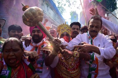 MUMBAI INDIA MAY 13 2023 Congress workers celebrate the victory after the party sweeps Karnataka assembly elections with absolute majority at MRCC Office Azad Maidan on May 13 2023 in Mumbai India Congress has won 135 seats well above the majority ma clipart