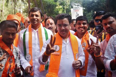 THANE INDIA OCTOBER 28 2024 Shiv Sena UBT candidate from Kopri Pachapakkhadi Kedar Dighe nephew of Anand Dighe going to file his nomination form at Wagle Estate on October 28 2024 in Thane India The Maharashtra Assembly elections are scheduled for No clipart