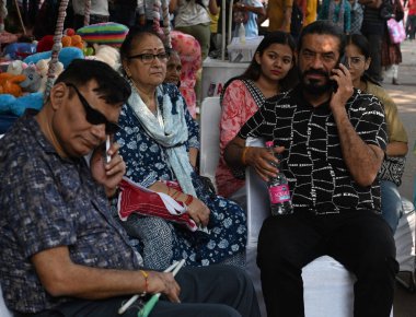 NEW DELHI INDIA OCTOBER 29 2024 Family members pay tribute during an event to commemorate the Delhi 2005 bomb blast victims at Sarojini Nagar Market on October 29 2024 in New Delhi India 62 people died and 210 were injured in three explosions in cent clipart