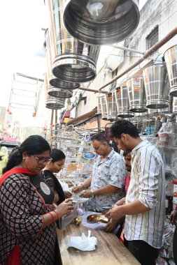 NEW DELHI INDIA OCTOBER 29 2024 People purchase Kitchen Utensils Item on Dhanteras a Hindu festival associated with Lakshmi the Goddess of wealth at Paharganj Market on October 29 2024 in New Delhi India Photo by Sonu Mehta Hindustan Times clipart