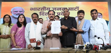 NEW DELHI INDIA OCTOBER 30 2024 Delhi BJP president Virendra Sachdeva along with Delhi MPs addressing the media person on the issue of Delhi health Ayushman scheme at Delhi BJP office on October 30 2024 in New Delhi India Delhi BJP MPs have taken leg clipart