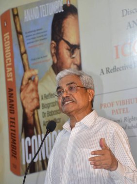 MUMBAI, INDIA,OCTOBER 30, 2024 Social Activist Researcher and Author Anand Teltumbde during launch of his book Iconoclast A reflective Biography of Dr Babasaheb Ambedkar at Press Club on October 30, 2024 in Mumbai ,India  clipart