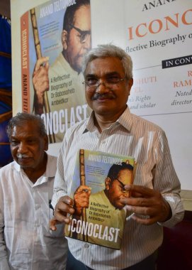 MUMBAI ,INDIA ,OCTOBER 30, 2024 Social Activist Researcher and Author Anand Teltumbde with Women rights activist Vibhuti Patel playwright and director Ramu Ramanathan and Ambedkar Scholar and writer Rahul Kosambi during launch of book Iconoclast  clipart