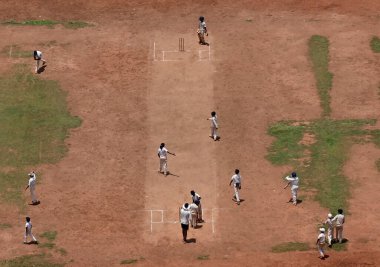 MUMBAI INDIA MAY 15 2023 Shadows of cricketers visible minimally as Mumbai experiences Zero Shadow Day phenomenon at Shivaji Park Dadar on May 15 2023 in Mumbai India On this day the Sun is said to be at its highest point and its rays hit the Earth s clipart