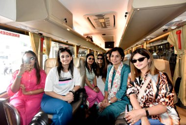 NEW DELHI INDIA MAY 16 2023 Co founder Ashoka Centre for a People Centric Energy Transition Mahua Acharya along with female pilot and other Bus women staff at the flag off ceremony of India s first all women intercity bus from Kashmere Gate ISBT on M clipart