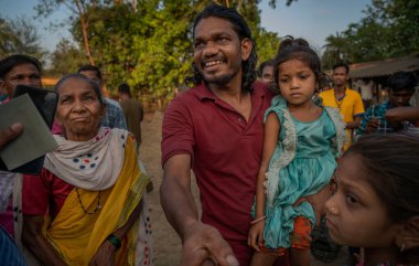 MUMBAI INDIA MAY 16 2023 Arjun Daware a fisherman who returned from Pakistan after three and half years breaks down with tears of joy after seeing his 4 year old daughter and family members at Aamgaon in Palghar district on Mumbai Ahmedabad Highway M clipart