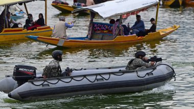 SRINAGAR INDIA MAY 17 2023 Navy s Marine Commandos MARCOS patrol ahead of upcoming G20 meeting in Dal Lake on May 17 2023 in Srinagar India Photo By Waseem Andrabi Hindustan Times clipart