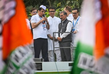 NEW DELHI INDIA NOVEMBER 8 2024 Delhi Pradesh Congress Committee President Devender Yadav along with Himachal Pradesh Chief Minister Sukhvinder Singh Sukhu and AICC Treasurer Ajay Maken during the flag off the month long Delhi Pradesh Congress Commit clipart