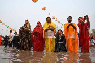 GURUGRAM INDIA NOVEMBER 8 2024 Hindu devotees offer prayers and performing rituals to the God Sun during rising to mark Chhath Puja Festival at Sheetla Mata Mandir parking site sector 5 road in Gurugram India on Friday 08 November 2024 Photo by Parve clipart