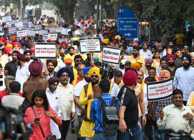 NEW DELHI INDIA NOVEMBER 9 2024 Members from Hindu Sikh Global Forum seen protesting over the alleged issues and clashes between Hindu and Sikh communities in Canada at Teen Murti Marg on November 9 2024 in New Delhi India The demonstration was a res clipart