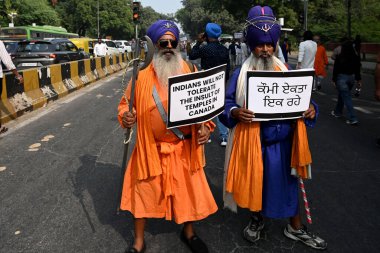 NEW DELHI INDIA NOVEMBER 9 2024 Members of Hindu Sikh Global Forum protesting against the incidents in Canada over violence on Temple in Brampton Canada near Canada Embassy Chanakyapuri on November 9 2024 in New Delhi India The demonstration was a re clipart