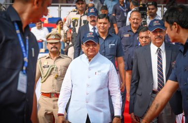 NEW DELHI INDIA NOVEMBER 9 2024 Vinai Kumar Saxena Lieutenant Governor of Delhi along with Sanjay Arora Commissioner of Police arrives during the opening ceremony of 73rd All India Police Athletics Cluster Championship 2024 25 at JLN Stadium  clipart