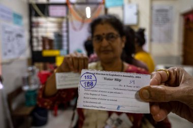 MUMBAI INDIA NOVEMBER 20 2024 The Election Commission and BMC issued tokens to voters to better crowd management at Borivali on November 20 2024 in Mumbai India Photo by Satish Bate Hindustan Times clipart