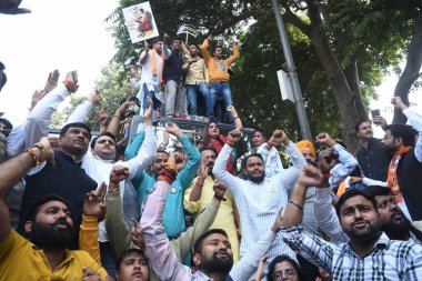 NEW DELHI INDIA NOVEMBER 21 2024 Delhi BJP workers stage a protest outside the residence of AAP National Convener and Former Delhi CM Arvind Kejriwal against use of expensive items at his earlier bungalow on November 21 2024 in New Delhi India Photo  clipart