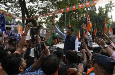 MUMBAI INDIA NOVEMBER 23: BJP leaders Devendra Fadnavis waves hand to his party workers while celebrating winning the state assembly election outside BJP Office Nariman Point on November 23 2024 in Mumbai India The BJP led Mahayuti alliance is on cou clipart