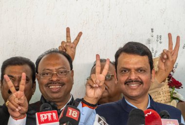 MUMBAI INDIA NOVEMBER 23: Devendra Fadnavis intract with media at his residence Sagar Bunglow as the BJP led Mahayuti alliance leads in the Maharashtra Assembly elections 2024 on November 23 2024 in Mumbai India The Mahayuti alliance comprising BJP S clipart