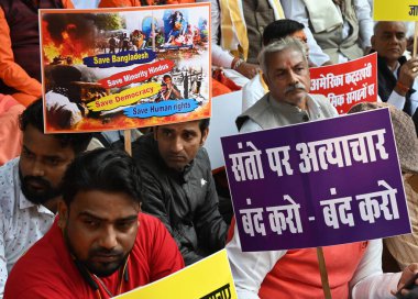 Hindu sadhus devotees and Member of Vishwa Hindu Parishad during the demonstration against atrocities on Hindus in Bangladesh at Jantar Mantar on December 2 2024 in New Delhi India  clipart