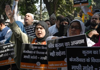 NEW DELHI INDIA DECEMBER 3 2024 Members of BJP Minority Morcha stage protest against AAP MLA Naresh Yadav who was recently convicted in a 2016 case of desecration of the Quran at Ashoka Road on December 3 2024 in New Delhi India  clipart