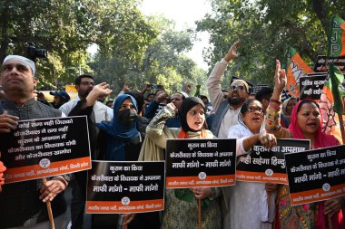 NEW DELHI INDIA DECEMBER 3 2024 Members of BJP Minority Morcha stage protest against AAP MLA Naresh Yadav who was recently convicted in a 2016 case of desecration of the Quran at Ashoka Road on December 3 2024 in New Delhi India  clipart