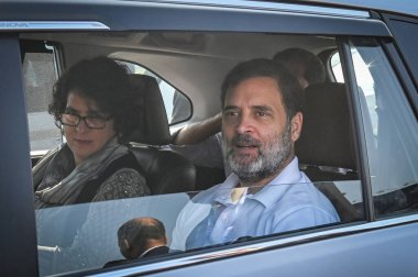 NEW DELHI INDIA DECEMBER 4 2024 Congress leader and LOP Rahul Gandhi seen along Congress Leader Priyanka Gandhi while on their way towards Sambhal at NH 24 near Akshardham on December 4 2024 in New Delhi India A Congress delegation led by Rahul Gandh clipart