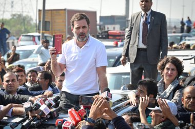 NEW DELHI INDIA DECEMBER 4 2024 Congress leader and LOP Rahul Gandhi seen along Congress Leader Priyanka Gandhi after getting stopped by UP Police while on their way towards Sambhal at NH 24 near Ghazipur Border on December 4 2024 in New Delhi India  clipart