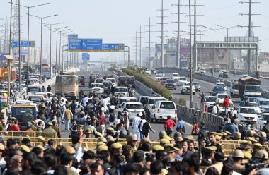 NEW DELHI, INDIA, DECEMBER 4, 2024 Massive traffic jam seen as UP Police installs barricades to stop the convoy of Congress leader and LOP Rahul Gandhi who was on his way to visit Sambhal at NH 24 near Ghazipur on December 4 2024 in New Delhi, India  clipart