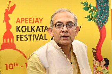 KOLKATA, INDIA - DECEMBER 6, 2024: The unveiling of 'Chhaunk' written by Nobel laureate Abhijit Banerjee on the occasion of Curtain Raiser of 16th Apeejay Kolkata Literary Festival at Oxford Book Store, on December 6, 2024 in Kolkata, India clipart