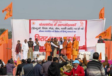 NOIDA, INDIA - DECEMBER 8, 2024: More than 1500 people, including religious leaders and women, gathered at Noida's Sector 33A ground on Sunday to protest against the alleged atrocities on minorities in Bangladesh, on December 8, 2024 in Noida, India. clipart