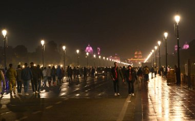 NEW DELHI, INDIA - DECEMBER 8, 2024: Delhiites get some relief from air pollution due to sudden rainfall near India Gate. Several parts of Delhi-NCR experienced heavy rainfall on Sunday, offering much-needed relief  clipart