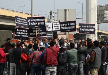 NEW DELHI, INDIA - DECEMBER 8: BJP leader Vijay Goel lead a protest against the AAP Government from Machhli Bazar Ghazipur to Kude Ka Pahar (Garbage dumpyard) at Ghazipur on December 8, 2024 in New Delhi, India.  clipart