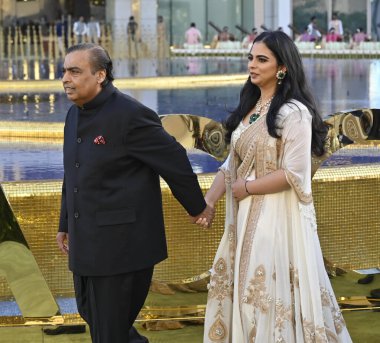 MUMBAI INDIA MARCH 31 2023 Mukesh Ambani with daughter Isha Ambani during the inauguration of the Nita Mukesh Ambani Cultural Centre NMACC at Bandra Kurla Complex BKC Bandra East on March 31 2023 in Mumbai India Nita Ambani's dream project clipart