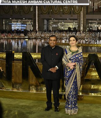 MUMBAI INDIA MARCH 31 2023 Mukesh Ambani with wife Nita Ambani during the inauguration of the Nita Mukesh Ambani Cultural Centre NMACC at Bandra Kurla Complex BKC Bandra East on March 31 2023 in Mumbai India Nita Ambani's dream project  clipart