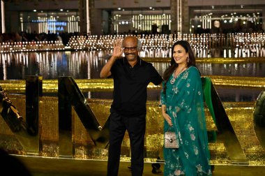 MUMBAI INDIA MARCH 31 2023 Rajinikanth with daughter Soundarya Rajinikanth during the inauguration of the Nita Mukesh Ambani Cultural Centre NMACC at Bandra Kurla Complex BKC Bandra East on March 31 2023 in Mumbai India Nita Ambani's dream project clipart