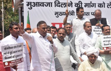 NEW DELHI INDIA APRIL 1 2023 Delhi BJP Kisan Morcha workers and Delhi farmers during the protest to demand Crop compensation and action against Minister Atishi near CM House Civil Lines on April 1 2023 in New Delhi India  clipart