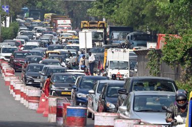 NEW DELHI INDIA APRIL 1 2023 Massive traffic jam seen as workers conduct repair work over Chirag Delhi flyover after half of its one lane from IIT towards Kalkaji gets closed for the movement of general traffic on April 1 2023 in New Delhi India Phot clipart