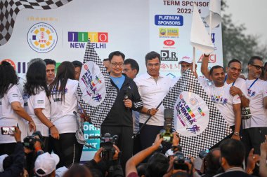 NEW DELHI INDIA APRIL 2 2023 Kiren Rijiju Minister of Law and Justice of India along with BJP MP Parvesh Sahib Singh Verma and Former Cricketer Ajay Jadeja flags off the IIFL Jito Ahimsa Run to promote Peace and Non Violence at Jawahar Lal Nehru Stad clipart