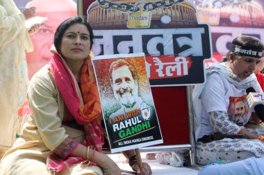 NEW DELHI, INDIA: APRIL 3, 2023 - All India Mahila Congress members on protest Save Democracy rally at Jantar Mantar to support Congress leader Rahul Gandhi after his disqualification from Parliament on April 3 2023 in New Delhi India.  clipart