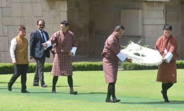 NEW DELHI, INDIA: APRIL 4, 2023 - Bhutan King Jigme Khesar Namgyel Wangchuck arrive for a wreath at the Mahatma Gandhi memorial at Rajghat on April 4 2023 in New Delhi India Photo by Sonu Mehta Hindustan Times clipart