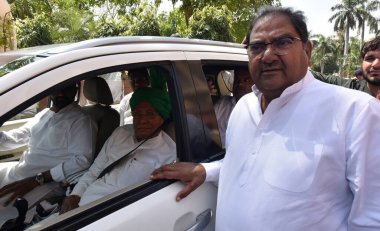 NEW DELHI INDIA APRIL 6 2023 INLD chief Om Prakash Chautala and JJP founder Ajay Chautala after pay tributes to Former Deputy Prime Minister of India Devi Lal on his death anniversary at Parliament House complex on April 6 2023 in New Delhi India Cha clipart