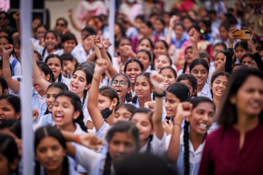 NEW DELHI INDIA APRIL 8 2023 School students seen in event where Chief Minister of Delhi Arvind Kejriwal along with Delhi education minister Atishi Marlena during lay the foundation stone of new building blocks at Rajkiya Sarvodaya Kanya Bal Vidyalay clipart