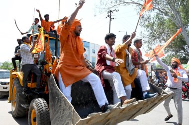 NOIDA INDIA APRIL 9 2023 Devotees from different Hindu organizations take out a procession after Hanuman Jayanti at Sector 2 on April 9 2023 in Noida India Photo by Sunil Ghosh Hindustan Times clipart