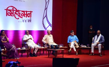 MUMBAI INDIA APRIL 11 2023 Eminent film director Jabbar Patel centre with NCP chief Sharad Pawar MP Supriya Sule and actors Mohan Agashe and Nana Patekar during a special discussion as Marathi movie Sinhasan completes a milestone of 44 years at Y B C clipart