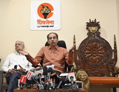 MUMBAI INDIA APRIL 11 2023 Former Maharashtra chief minister and chief of Shiv Sena UBT Uddhav Thackeray addresses a press conference in the presence of party leader Subhash Desai at Matoshree Bandra East on April 11 2023 in Mumbai India Photo by Vij clipart