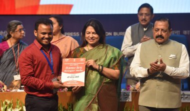 NEW DELHI INDIA APRIL 13 2023 Minister of State Independent Charge for Science and Technology and Earth Sciences Jitendra Singh with Meenakshi Lekhi MOS for External Affairs and Culture distribute appointment letters to candidates at a Rozgar Mela at clipart