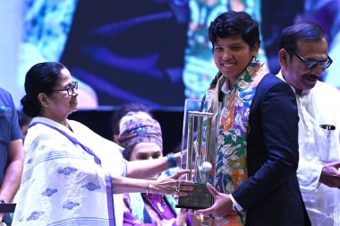 KOLKATA INDIA APRIL 13 2023 Indian Women cricketer Richa Ghosh was felicitated by West Bengal Chief Minister and TMC supremo Mamata Banerjee during inauguration of Dhana Dhanye auditorium Alipore on April 13 2023 in Kolkata India The building has six clipart