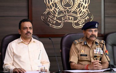 LUCKNOW INDIA APRIL 13 2023 ADG Law and Order Prashant Kumar R and ADG STF Amitabh Yash during a press conference regarding the encounter killing of gangster turned politician Atiq Ahmed s son Asad and a shooter Ghulam accused in the Umesh Pal murder clipart